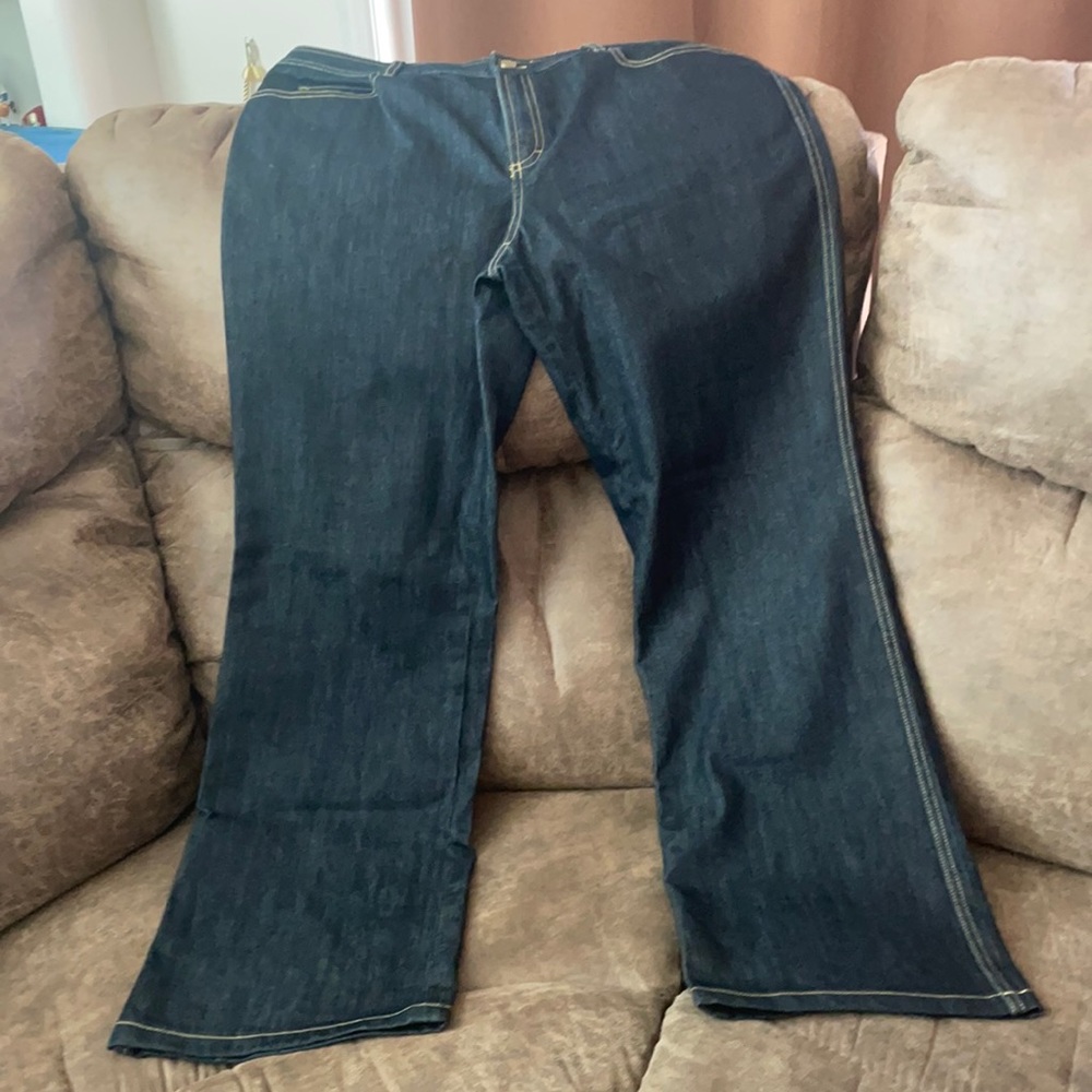 Dana Buchman women’s boot cut dark blue jeans.